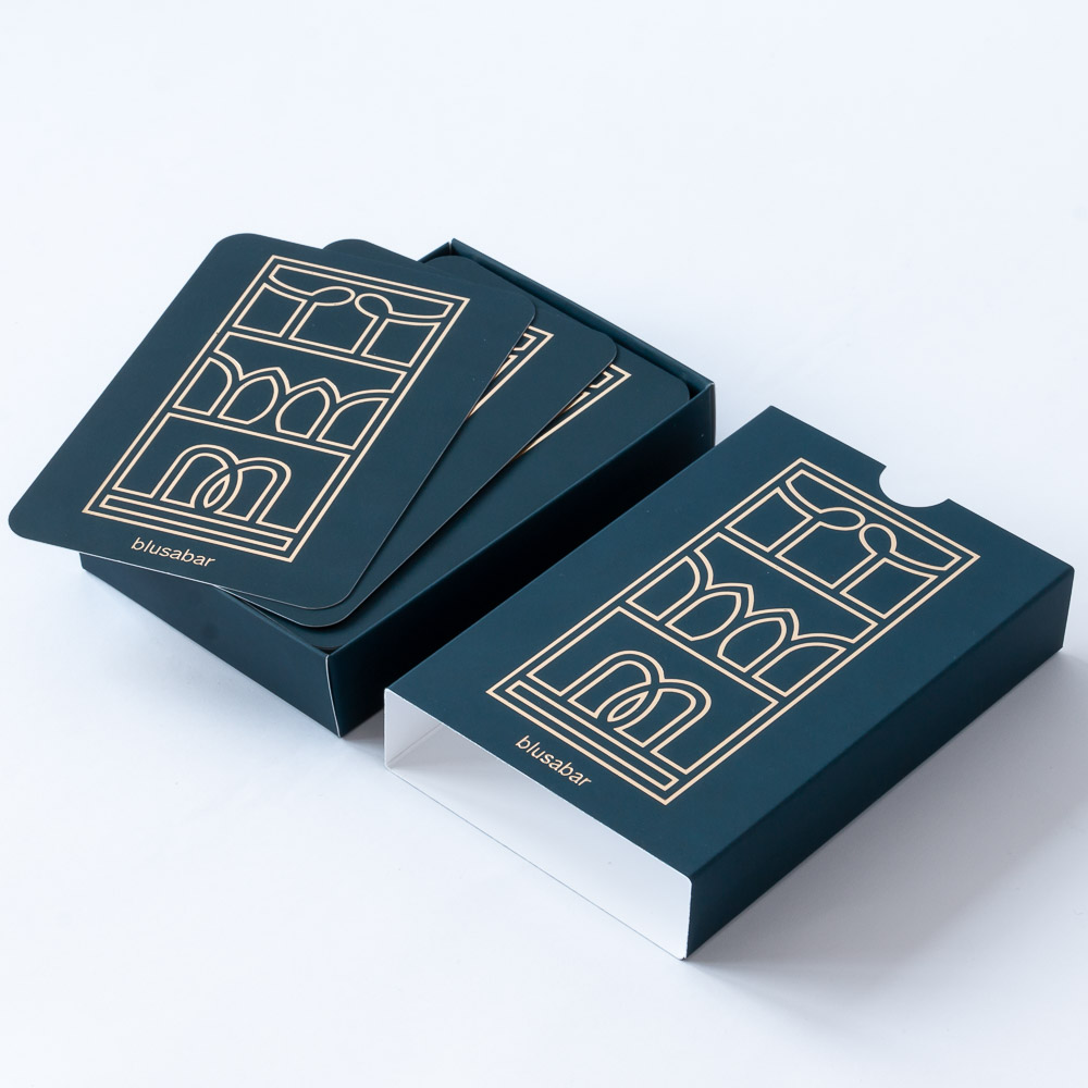 Product photography of foil detailed card packaging