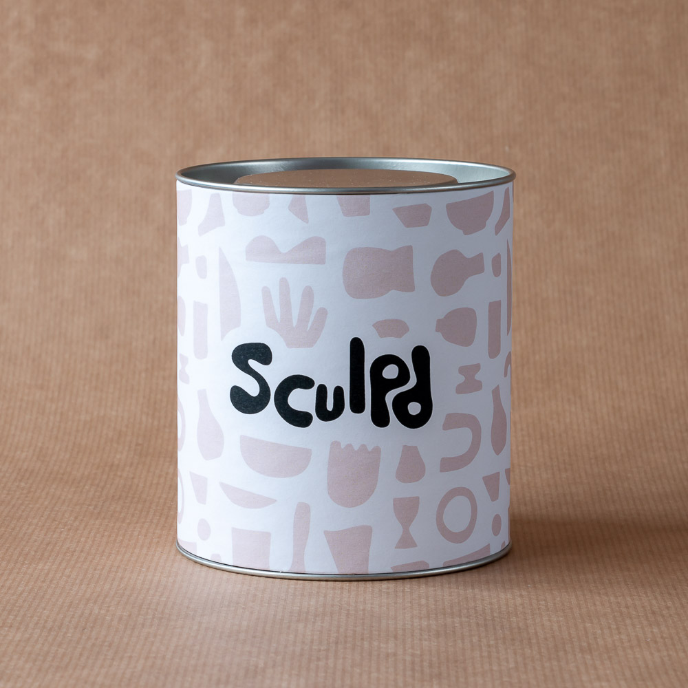 Product photography of Sculpd branded tube with metal lid