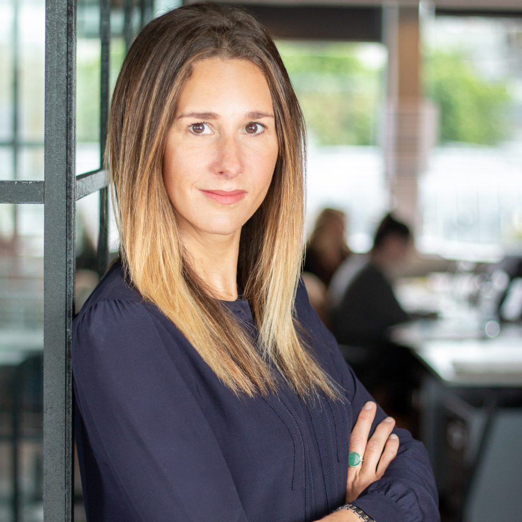 Female headshot in office environment