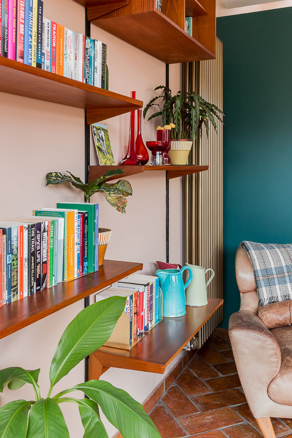 Interiors photography of stylish open bookshelves